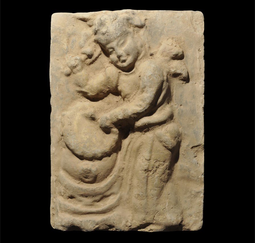 Chinese Ceramic Musician Tile: Song Dynasty, 960-1127 AD. A cast rectangular wall-tile with figure of a standing drummer modelled in the half-round. 2.6 kg, 26.5 cm (10 1/2"). UK art market, acquired prior to 1980.