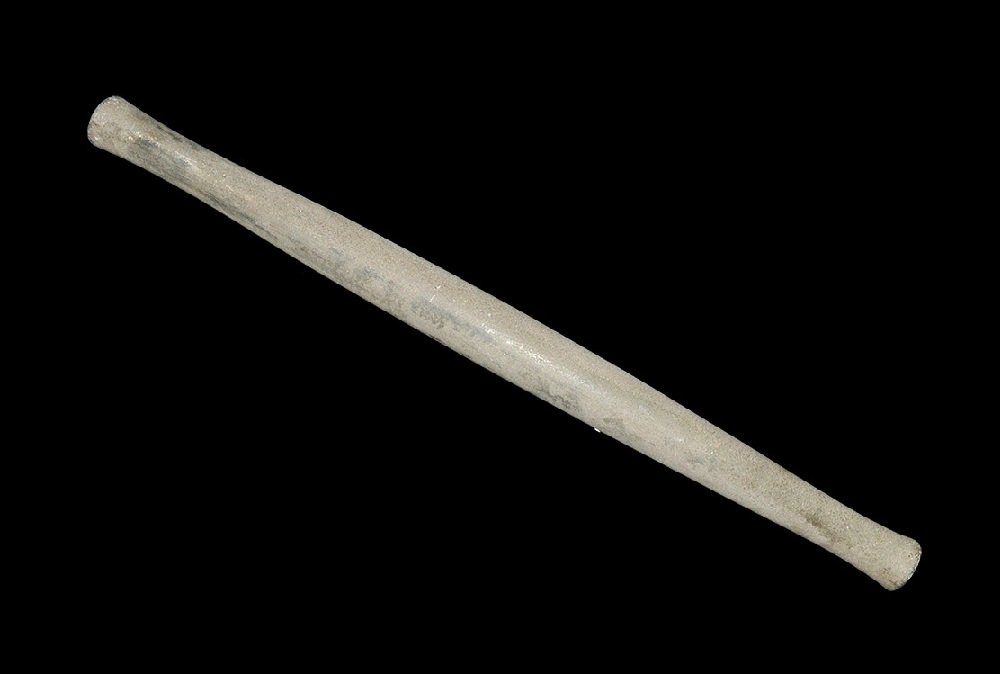 Near Eastern Style Bactrian Stone Staff: An undated archaistic carved staff with slightly bulbous middle, waisted to each end. 5.7 kg, 88 cm (34 1/2"). Acquired on the London art market in the 1980's. [No Reserve]