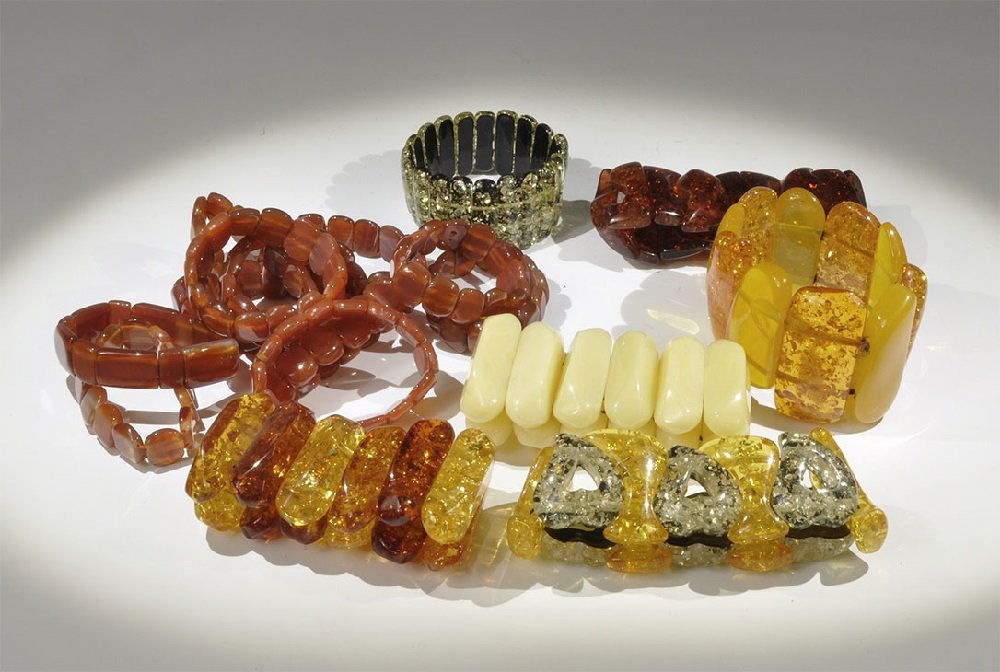 Jewellery Composition Bracelet Group: A mixed group of undated archaistic strung bead bracelets in shades of cream, ochre, amber and black. 745 grams Acquired on the London art market in the late 1980s. [17, No Reserve]