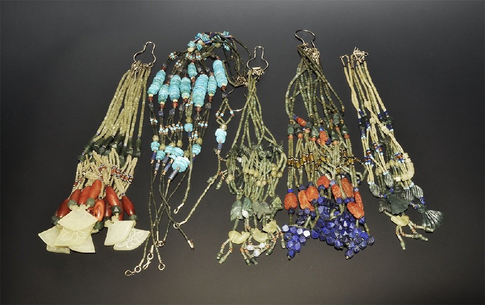Jewellery Bead String Group: A mixed group of thirty undated archaistic bead strings, mainly tubular, fusiform and irregular in form; turquoise, lapis lazuli, carnelian and other materials. 950 grams Private collection, London, U
