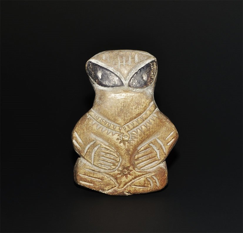 Stone Age Vinca Style Ceramic Idol: An undated archaistic cast miniature idol with lentoid eyes, hands placed on the abdomen. 57 grams, 73 mm (3"). Private collection, UK; formed in the 1980s. [No Reserve]