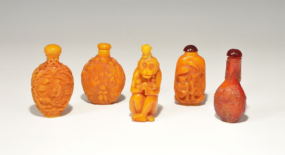 Chinese Style Composite Snuff Bottle Collection: A mixed group of undated archaistic snuff bottles, three with figural decoration, one with fish and one shaped like a monkey cradling its young. 237 grams total, 70-81 mm (2 3/4 - 3 1/4"). Property of