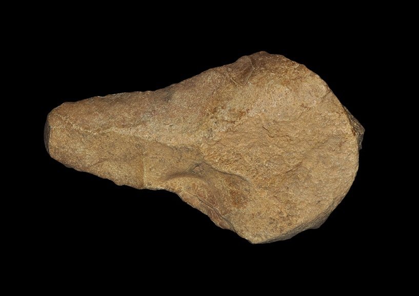 Stone Age Continental Flint Handaxe: Palaeolithic, 450000-350000 BP. A medium-sized handaxe of triangular form, carefully knapped to the two sides with rounded butt showing evidence of use as a hammer stone, in a yellow-brown chert showi