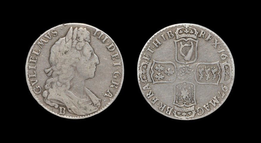 English Milled Coins - William III - 1697 Bristol -: Dated 1697, first bust. Obv: profile bust with B below for Bristol mint with GVLIELMVS III DEI GRA legend. Rev: cruciform shields with date and MAG BR FRA ET HIB REX legend. Edge: NONO. S. 3488; ESC 5