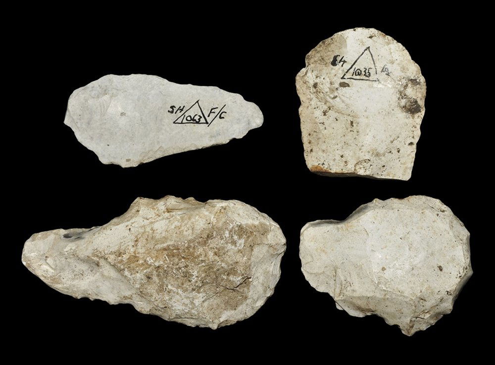 Stone Age British 'Avebury' Implement Group: Neolithic, 3000-1500 BC. A mixed flint group comprising: a slender blade-knife with carefully knapped edge, with inked excavation reference number and accompanied by inked label 'Neolithic ground edge