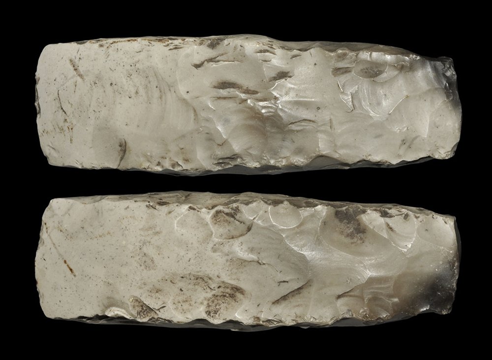 Stone Age Danish Thick-Butted Polished Chisel: Neolithic, 5000-3000 BC. A finely made thick-butted chisel with parallel sides and narrow, polished cutting edge; in a grey flint. See Glob, P. V., Danske Oldsager, number 247 for a similar example. P