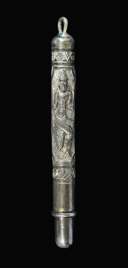 Indian Silver Figural Pendant Holder: 19th century AD or later. A tubular canister with separable lower section and suspension ring above; the sides with repoussé decoration of foliage, two dancers reserved against a textured field. Ex S