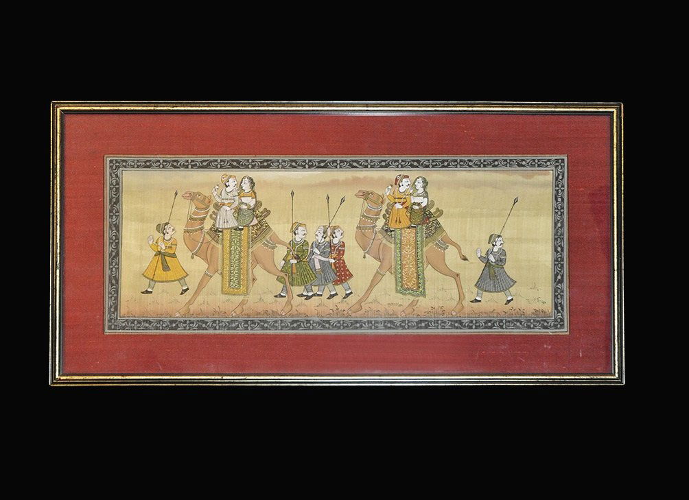 Near Eastern Persian Gilt-Framed Painting: 19th century AD or later. A framed painting on fine-woven fabric of a processional scene featuring two noble couples on camels accompanied by attendants with spears. Acquired on the London art market