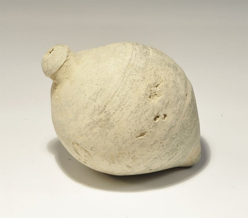 Byzantine Ceramic 'Greek Fire' Hand Grenade: 9th-11th century AD. A hollow ceramic vessel with domed top and conical base, short neck and chamfered rim. 555 grams, 11.5 cm (4 1/2"). Private collection, Cambridgeshire, UK; acquired prior to 2000.