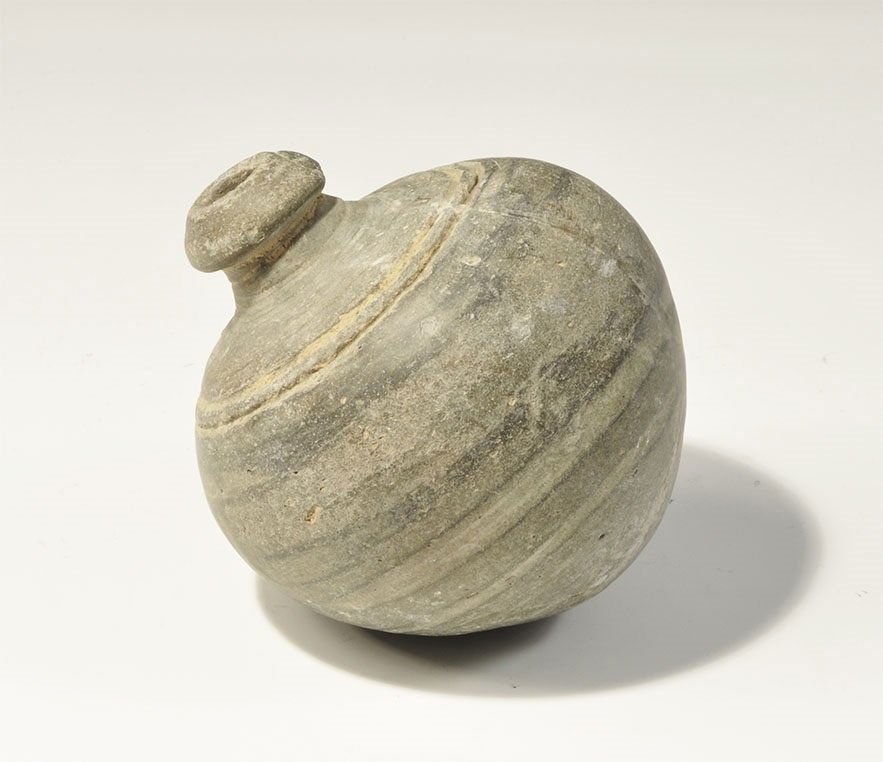 Byzantine Ceramic 'Greek Fire' Hand Grenade: 10th-13th century AD. A greyware vessel, ovoid in profile, with incised concentric lines to the shoulder, short neck with chamfered rim. 467 grams, 10 cm (4"). Private collection, Cambridgeshire, UK;