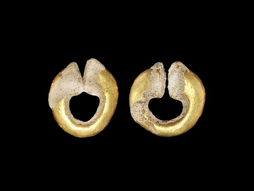 Cambodian Gilt-Bronze Earring Pair: 1st millennium AD. A matched pair of earrings, each a round-section bar with flared terminals. 39 grams, 26-28 mm (1"). Ex South East London collection; acquired in the late 1990s. TimeLine Auctions L