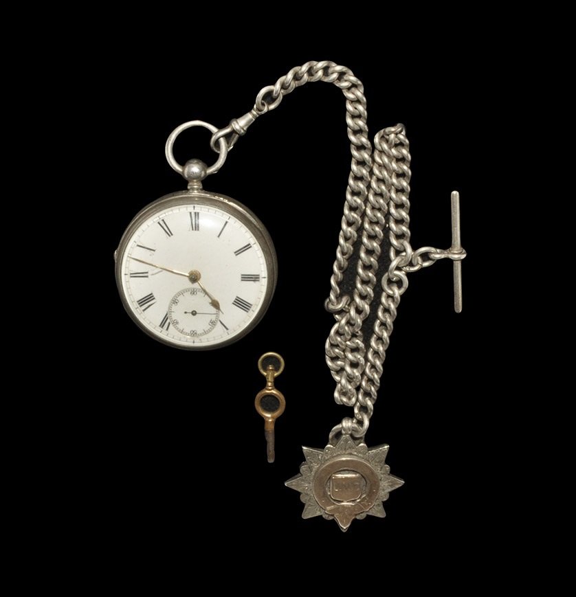 Watches Silver Pocket Watch, Albert Chain & Fob: Hallmarked Chester, 1876-1877 AD. A substantial pocket watch by John Bennett, inscribed internally to the dust cover with his name, the address '65 & 64 Cheapside London' and 'Maker to the Royal Obser
