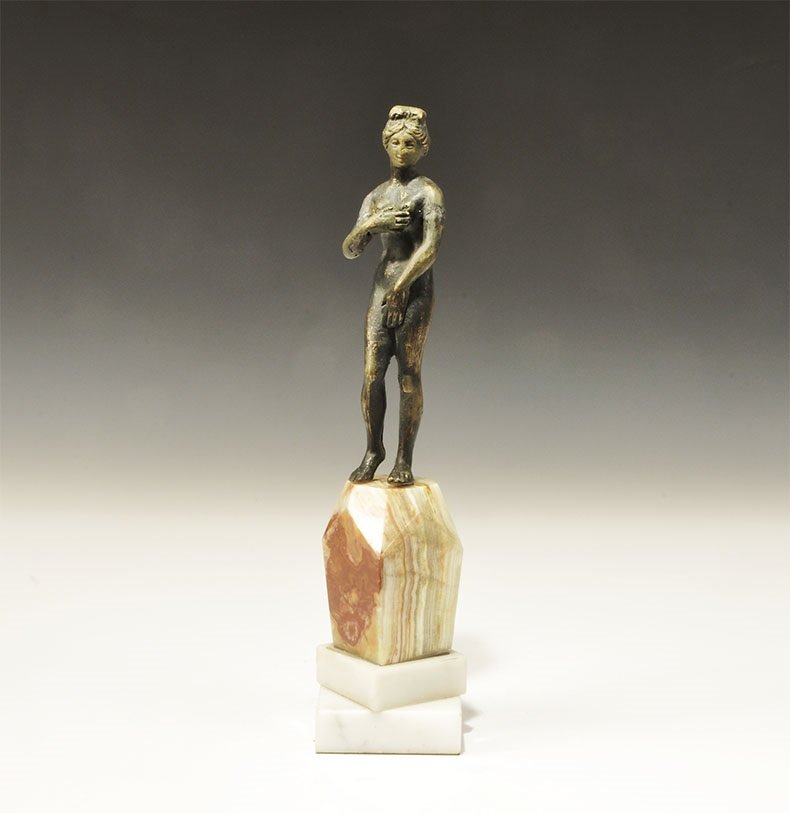 Roman Style Bronze Venus Statuette: 19th century AD. A cast bronze Grand Tour figurine of Venus standing nude; mounted on an onyx column and marble base. 1.2 kg, 29 cm (11 1/2"). From an old Hampshire collection. TimeLine Auctions Ltd a