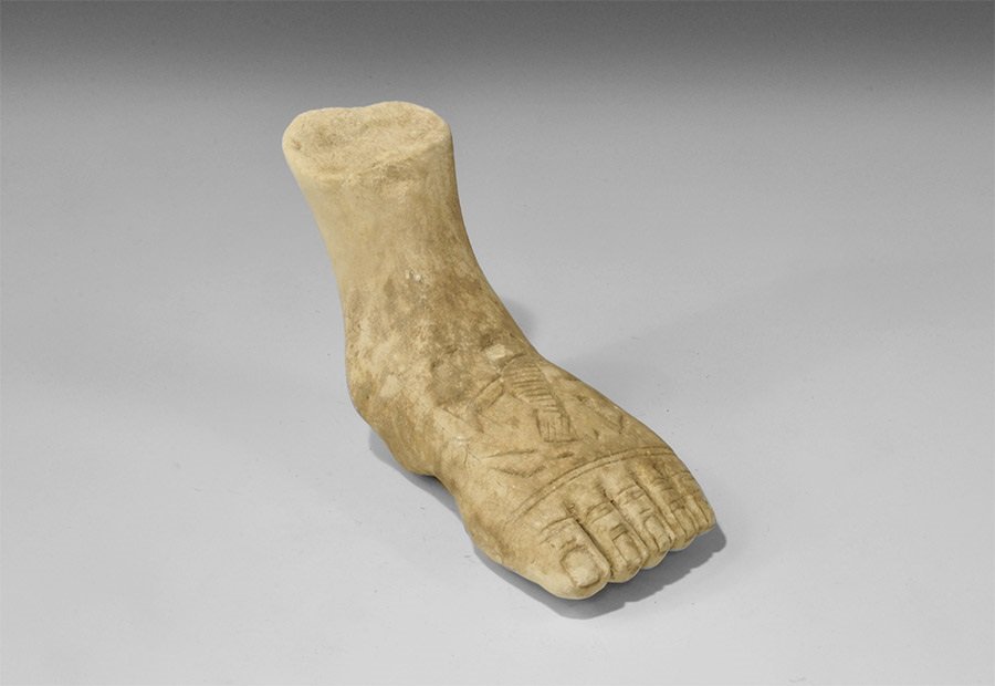 Egyptian Style Composition Foot: An undated archaistic representation of a human foot with hieroglyphic text to the upper face. 1.1 kg, 20 cm (8"). Property of a North East Essex collector; acquired in the 1980s. TimeLine Auctions Lt
