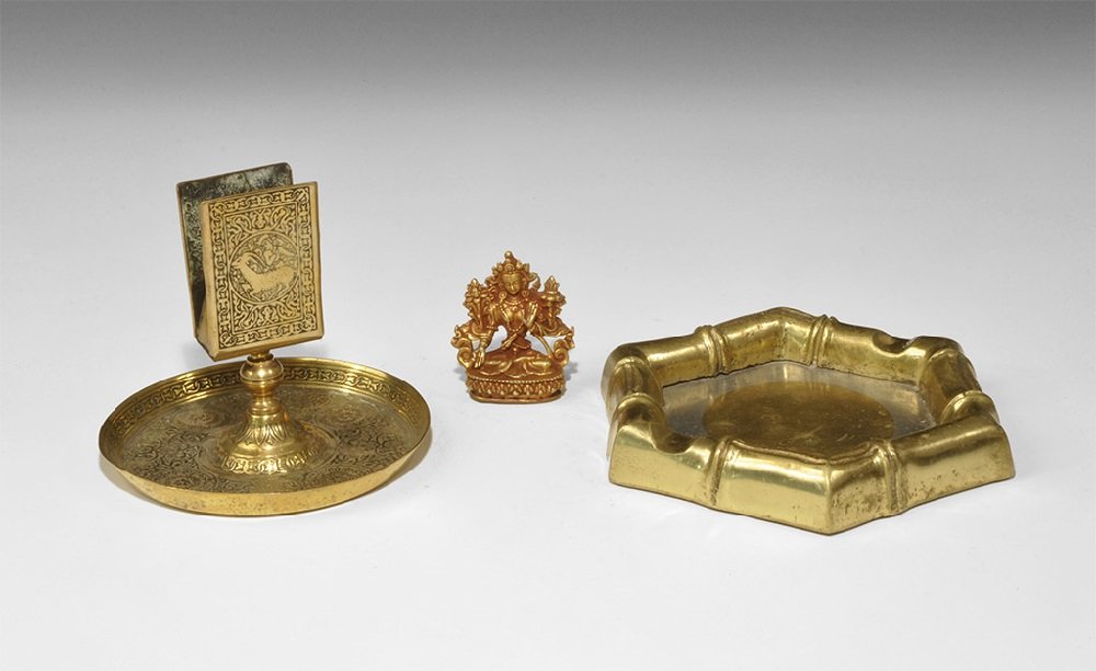 Vintage Brass Item Group: 20th century AD. A mixed group of artefacts comprising: a brass matchbox holder with swivelling arm and shallow tray, stamped 'KINCO Made in England; a hexagonal ashtray with bamboo detailing to the r