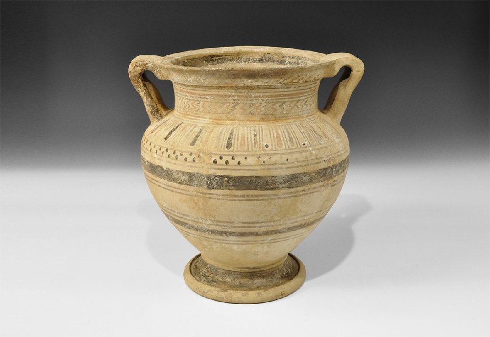 Greek Ceramic Painted Krater: 6th-5th century BC A large bell-shaped vessel with carinated foot, broad neck and everted rim; two strap handles to the shoulder, each with bifurcated lower end; painted with circumferential bands of