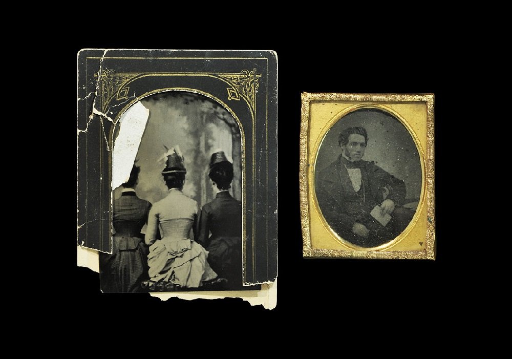 Antique Early Daguerreotype Photograph Glass Ambrotype: Mid-19th century AD. A group of two early Daguerrotype photographic images comprising: a tin-type (a direct positive on a thin sheet of iron coated with lacquer) view of three fashionable ladies taken