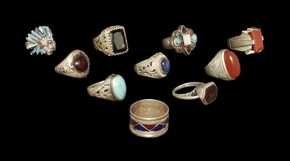 Vintage Silver Finger Ring Group: 20th century AD. A mixed group of finger rings comprising: four with inset cabochon; one with inset intaglio of a running horse; two with insert facetted stones; one a hoop with filigree bands, enamel