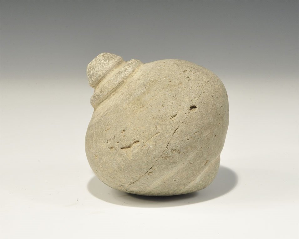 Byzantine Ceramic Greek Fire Grenade: 9th-11th century AD. A hollow ceramic vessel with domed top and conical base intended to be filled with explosive liquid and a wick, and used as a hand grenade; discoid plaque to the shoulder and wide