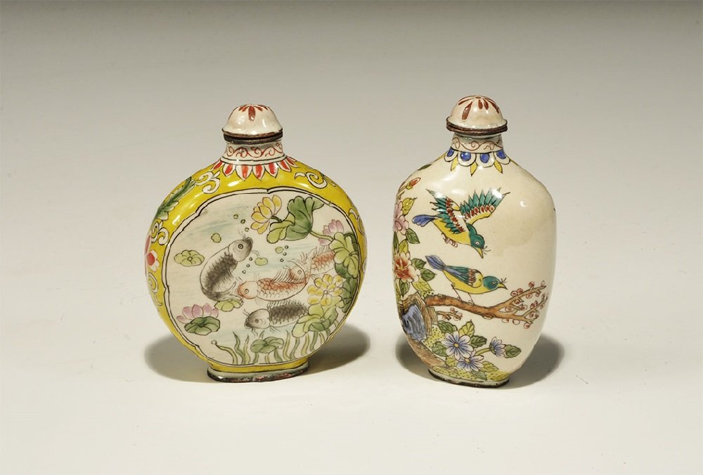 Chinese Enamelled Ceramic Snuff Bottle Pair: 20th century AD. A group of two polychrome snuff bottles comprising: one discoid with aquatic scenes to the flat faces, signature block to the underside; one bulbous with scene of birds on a branch, s