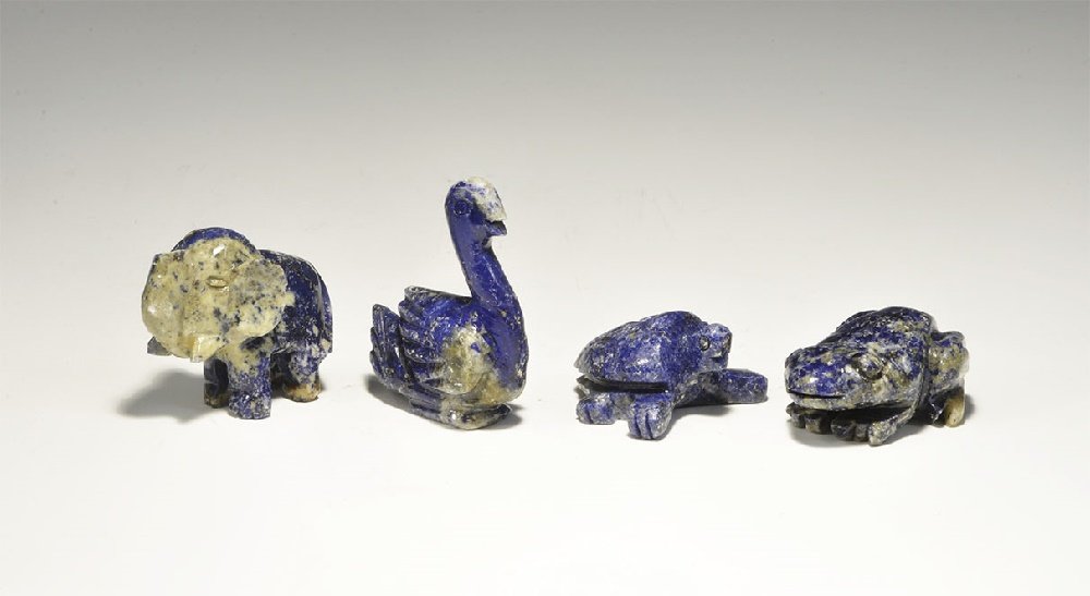 Near Eastern Carved Lapis Lazuli Animal Group: 20th century AD. A mixed group of carved animals comprising a frog, elephant, swan and turtle. 97 grams total, 35-45mm (1 1/4 - 1 1/2"). Acquired on the London art market in the late 1980s. TimeLine A