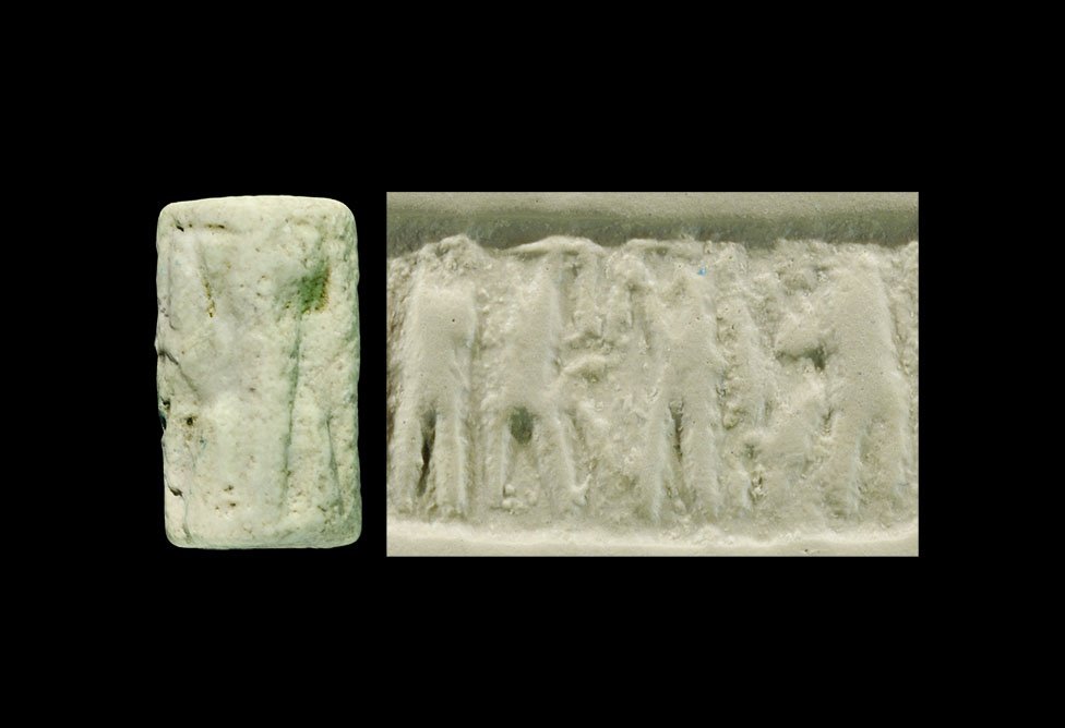Near Eastern Akkadian Cylinder Seal with Standing: 2300-2200 BC. A limestone seal showing a row of five standing figures, accompanied by an old scholarly note, typed and signed by W.G. Lambert, late Professor of Assyriology, University of Birmingham,