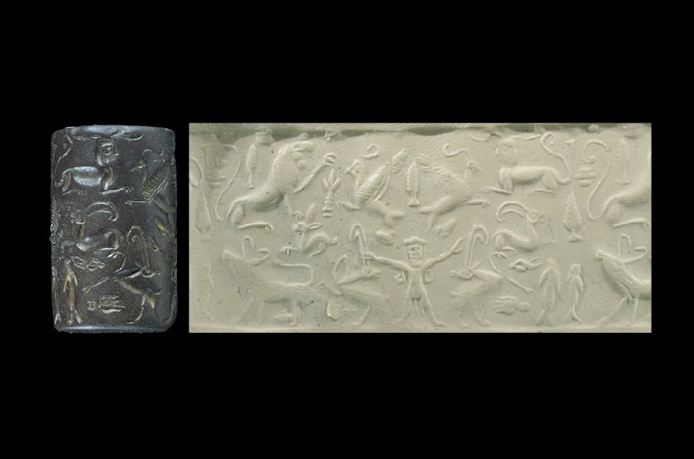 Near Eastern Anatolian Cylinder Seal with Master of: 1800 BC. A black jasper cylinder with intaglio motif of a long-haired figure seizing two ibexes by the antlers, with nine other birds, fish, and a sphinx in the field, additional trees and plants. Cf.
