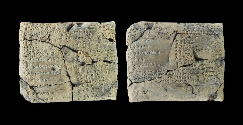 Near Eastern Babylonian Ceramic Cuneiform Tablet: 1400-1000 BC. An ochre pillow-shaped tablet with an extensive cuneiform text of the Middle Babylonian period describing haruspication, divination by examination of the entrails of sacrificed animals. 