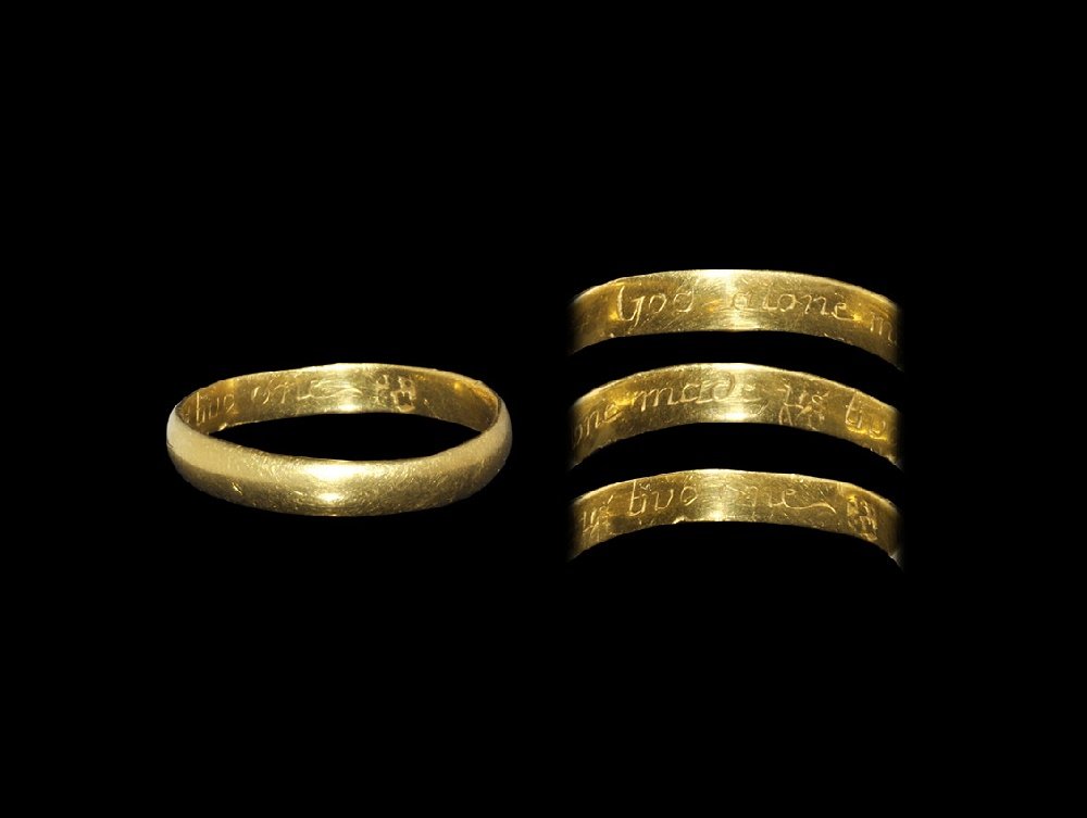 Post Medieval Gold 'God alone made us two one' Posy: 18th century AD. A plain flat-section hoop with italic text to the inner face 'God alone made us two one' with extended serifs to the 's', maker's mark 'S' between pellets over 'GW'. Cf. Evans, J. Eng