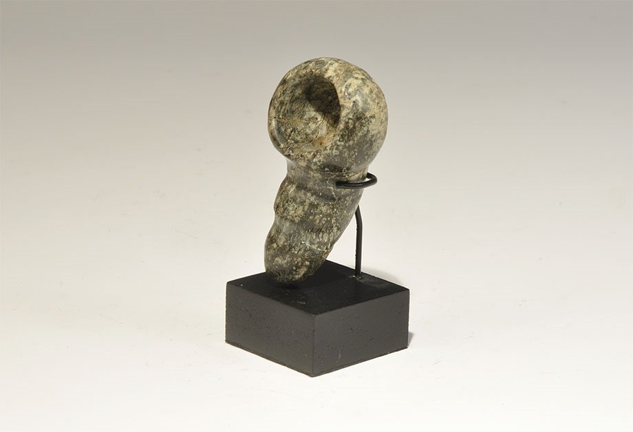 Islamic Steatite Phallic Smoking Pipe: Late 18th-early 19th century AD. A carved smoking pipe in the form of a phallus; mounted on a custom-made stand. 88 grams total, 90mm including stand (3 1/2"). Property of a West London gentleman; acq