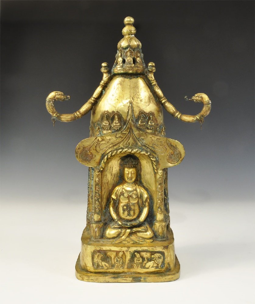 Chinese Style Gilt-Bronze Buddhist Shrine: An undated archaistic hollow-cast conical shrine with figure of Buddha to one face above panels with lions, miniature figures to the domed upper and serpent-headed recurved bars; figures in alcoves to