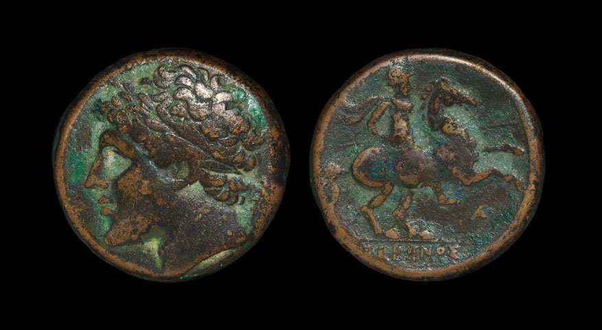 Ancient Greek Coins - Syracuse - Hieron II - Horseman: . 275-215 BC. Obv: laureate head of Hieron left. Rev: IERWNOS beneath horseman, wearing helmet, cuirass and chlamys, on horse prancing right, holding couched lance, AG monogram beneath the horse. Hoov