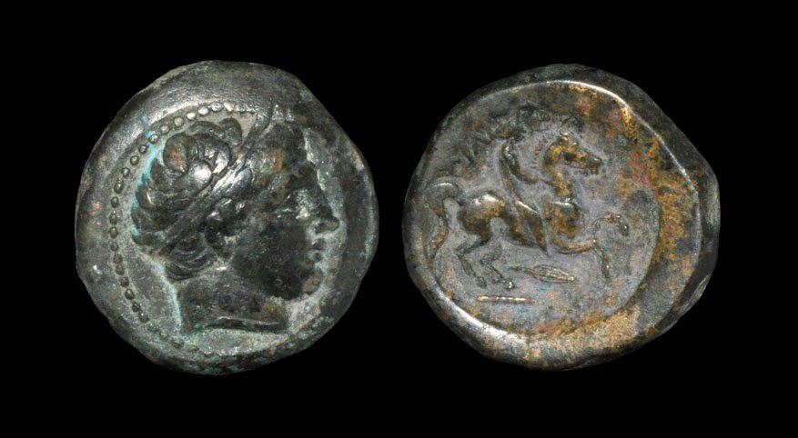 Ancient Greek Coins - Macedonia - Philip II - Bronze: 359-336 BC, uncertain mint in Macedonia. Obv: head of Apollo right, wearing taenia. Rev: FILIPPOU legend with naked youth on horse prancing right on ground line, spearhead below. 8.23 grams. SNG ANS 8