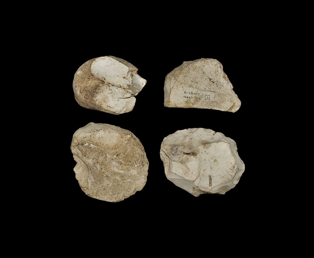 Stone Age British 'Avebury' Implement Group: Neolithic, 3000-2000 BC. A mixed flint group comprising: two D-shaped scrapers, one with old inked museum collection number '1146' and circumflex above; a globular nodule with one worked edge; a facet