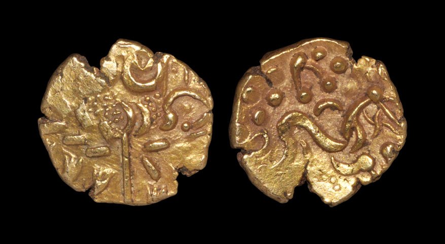 Celtic Iron Age Coins - Corieltauvi - Early Uninscribed: 50-10 BC, NE5-6. Obv: wreath, cloak and crescents with tiny pellets within the design. Rev: disarticulated sinuous horse right, pellets and charioteer's arms above, pelletal 'sun flower' below, with s