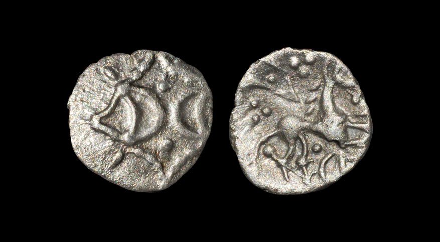 Celtic Iron Age Coins - Iceni - 'Mini ECE' Silver Half: 10-40 AD. Obv: open crescents with two pellets within corded lozenge. Rev: horse right with pellet trefoil each side of V above and pellet and ECE below. 0.43 grams. S. -; BMC 4216; ABC 1687.