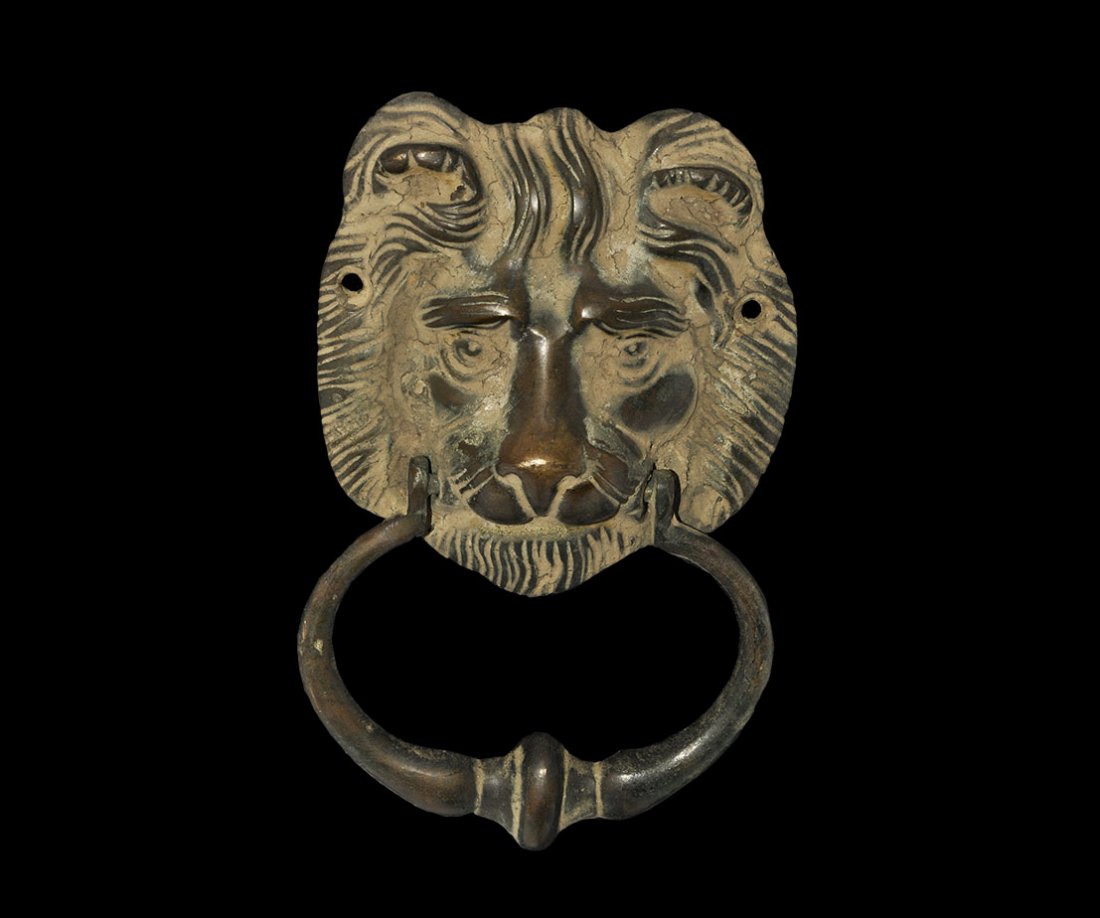 Indian Bronze Lion Head Door Handle: India, 19th-early 20th century AD. Cast bronze lion handle with ring in mouth. 663 grams, 18cm (7"). From an old London collection, formed in the 1980s. Made for the Anglo-Indian market. [No Reserve]