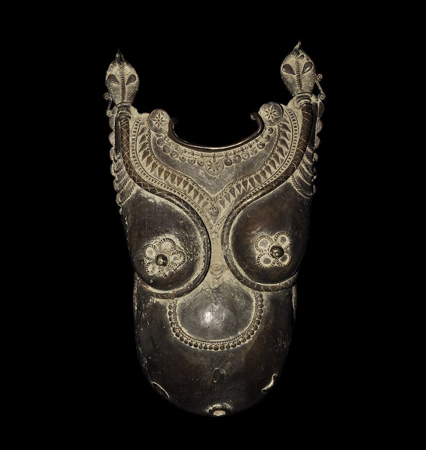 Indian Bronze Torso Cover: India, 18th-19th century AD. Cast bronze cover for a statue in the form of a female torso with prominent belly and breasts decorated with necklaces and two rearing cobras at the shoulders. 9.5 kg, 65c