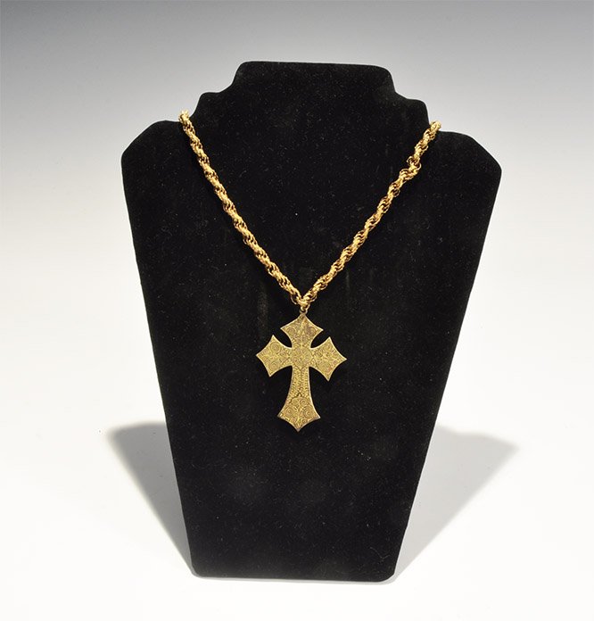 Post Medieval Pendant Cross and Chain: 20th century AD. A cross clechée pendant with etched detail to both faces, five domed studs, chain of annular links with granule detailing. 38 grams, 54.5cm (21 1/4"). Ex Booth collection. [No Reserv