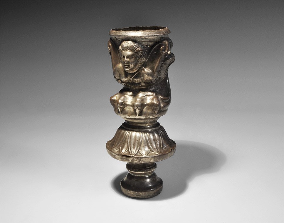 Greek Eastern Hellenistic Couch Foot: 3rd-1st century BC. A foot from a couch or stool formed as a tiered foot and baluster with broad lotus-leaf collar, lion's claw with swept curves to the rear, bust of Diana (?) with acanthus leaves an