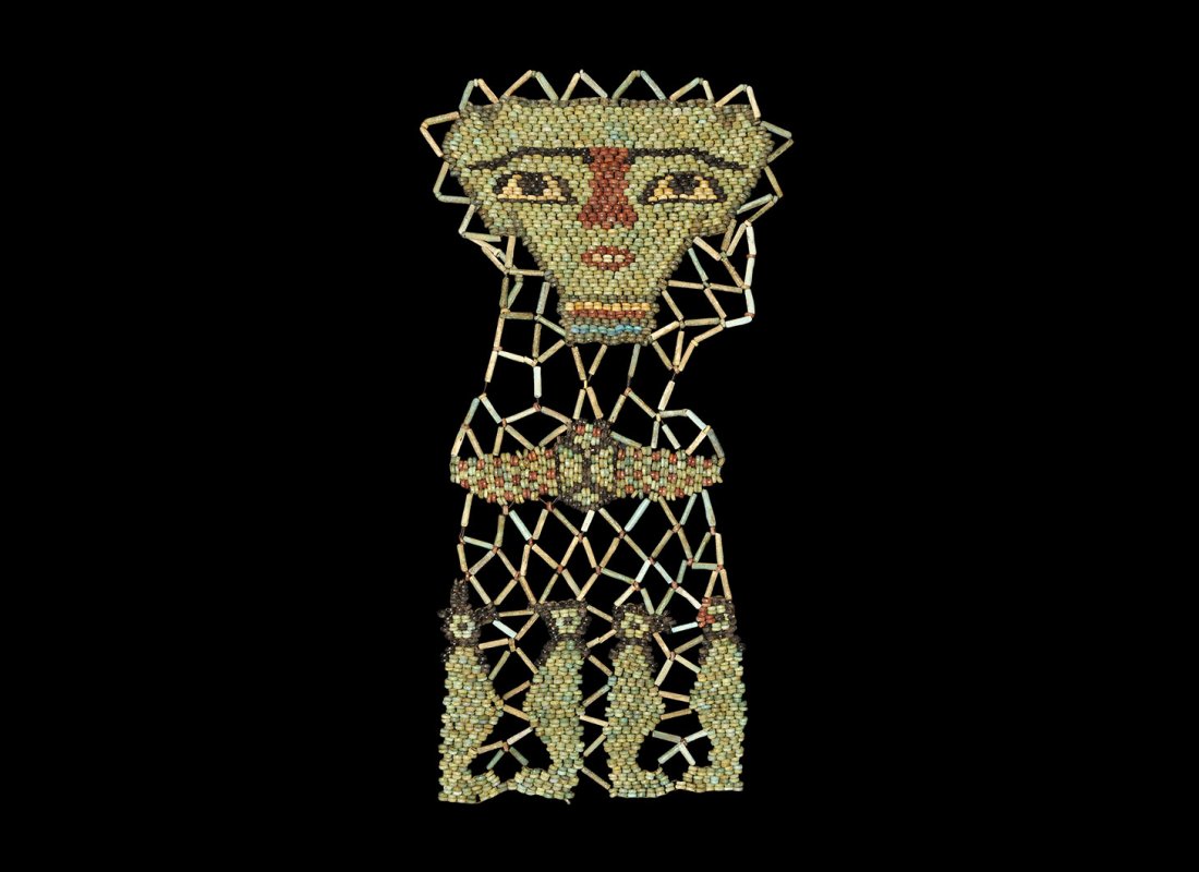 Egyptian Beaded Mummy Face Mask with Scarab and Figures: Ptolemaic Period, 332-30 BC. A restrung panel of small glazed composition beads in various colours representing a mummy face mask with looped border, scarab with wings extended and two pairs of facing