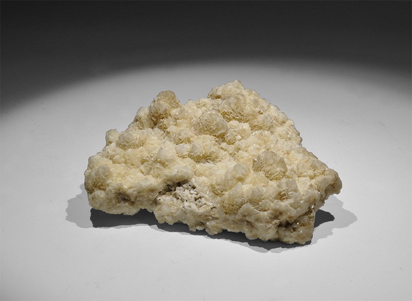 Natural History - Baryte Mineral Specimen: . A specimen of baryte, bearing an old adhesive paper label reading: ‘Cockscomb Baryties, from Crich…’, in old white card tray, from the Gregory, Bottley, and Lloyd collection. James Reynolds Gr