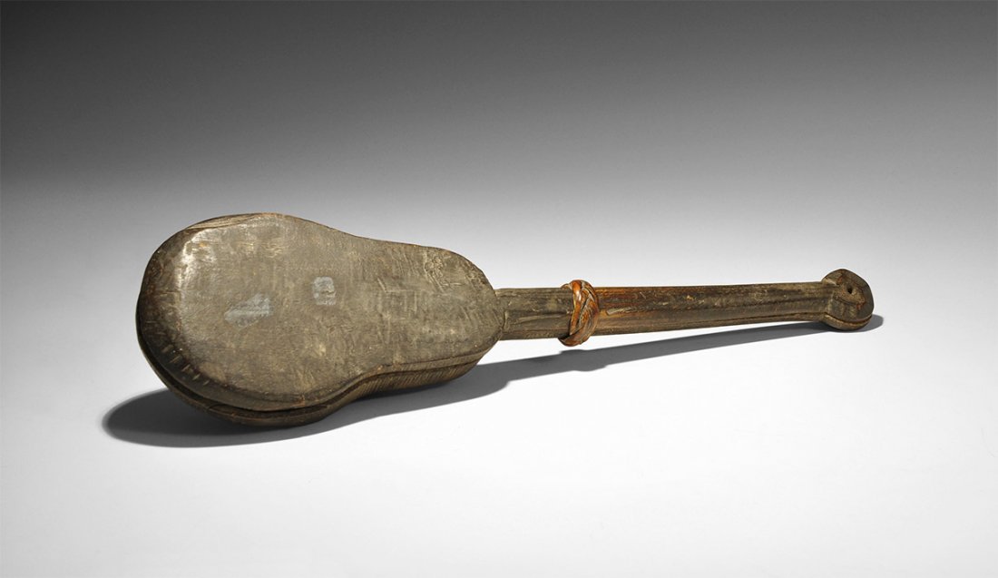 Thai Cased 'Fiddle' Scale Set: 19th century AD. A weighing scale and wooden case comprising: a round-section bone arm with pointillé calibration marks, bronze annular level and gnomon, loop and linen(?) threads supporting a bronze