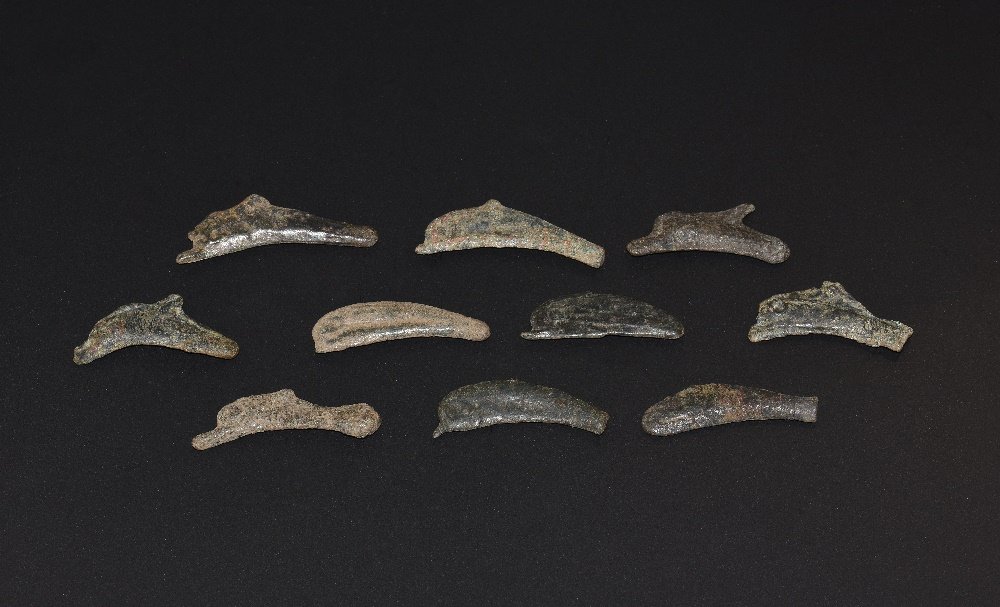 Ancient Greek Coins - Thrace - Olbia - Dolphin Money: 5th-3rd century BC. A group of flat sectioned bronze dolphins with detailing of the eye, dorsal fin and tail. 18 grams, 25-33mm (1 3/4"). Sear 1684. This unique type of coinage was cast in Olbia, in t