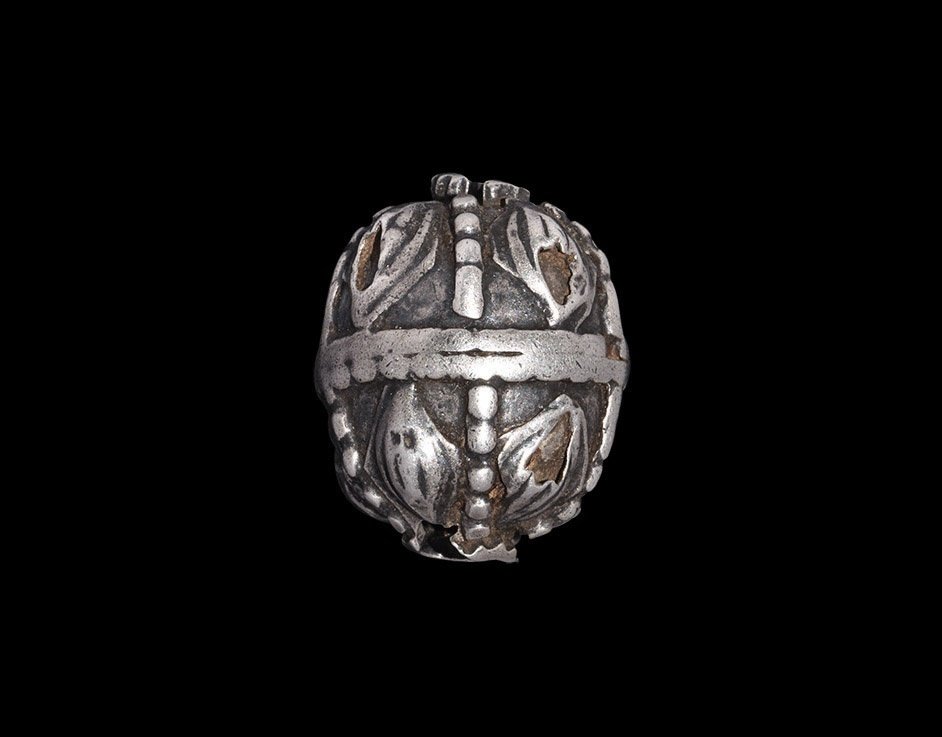 Viking Filigree Bead: 8th-12th century AD. A large silver bead with filigree leaf and rib pattern; pierced either end for suspension. 3.90 grams, 20mm (3/4") Property of an American collector; acquired 1980-2000. [No Reser