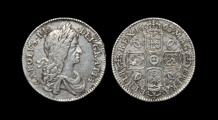 English Milled Coins - Charles II - 1663 - Shilling: Dated 1663 AD. First bust. Obv: profile bust with CAROLVS II DEI GRATIA legend. Rev: cruciform arms with CC monogram in angles and MAG BR FRA ET HIB REX legend and date. 5.67 grams. S. 3371; ESC 1022.