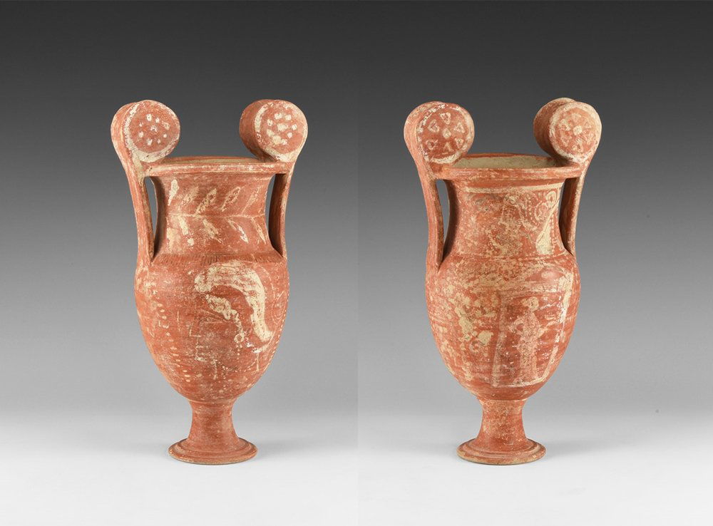 Greek Volute Krater with Figures: 5th-3rd century BC. A ceramic vessel with pierced pedestal foot, bulbous body, waisted neck, flared and chamfered rim, two lateral strap handles terminating in large gusseted discs; the inner surface