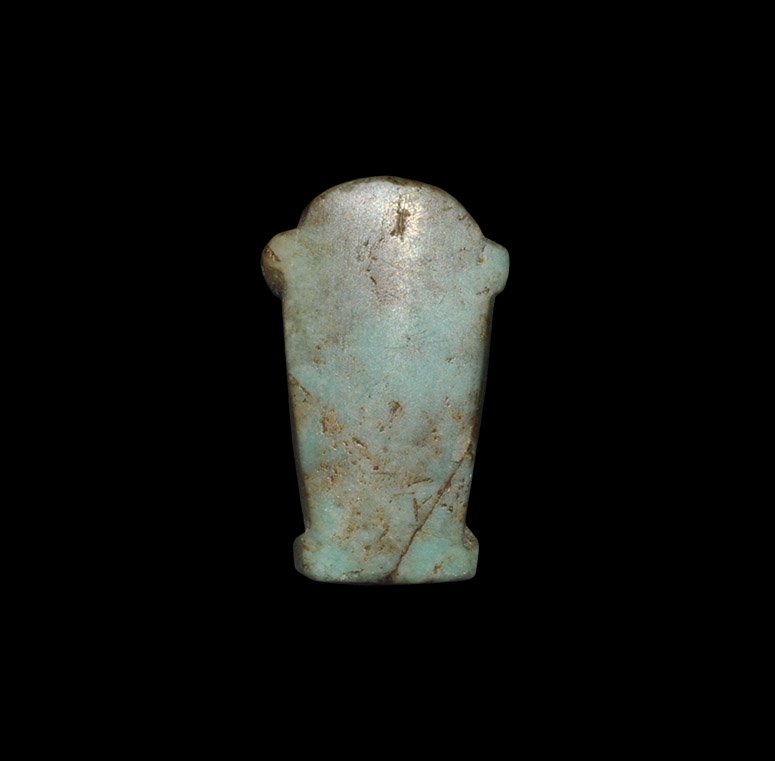 Egyptian Lotus Flower Amulet: Late Period, 664-332 BC. A green hardstone amulet in the form of a closed lotus flower. See Andrews, C. Amulets of Ancient Egypt, London, 1994, p.88. 1.64 grams, 18mm (3/4"). Acquired on the London ar