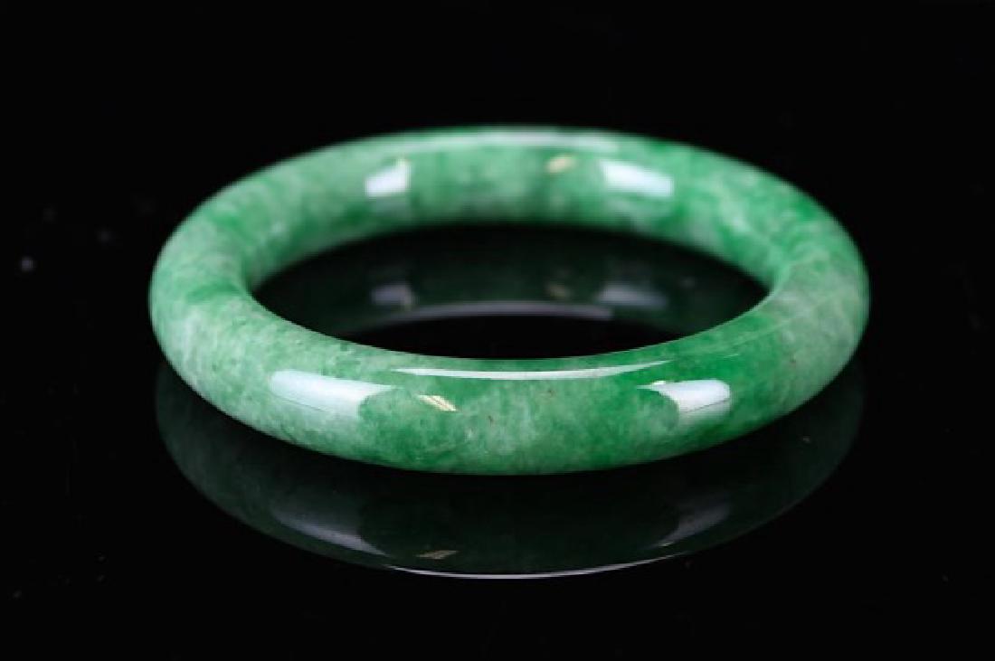 GIA TRANSLUCENT GREEN JADEITE BRACELET (1 of 2)