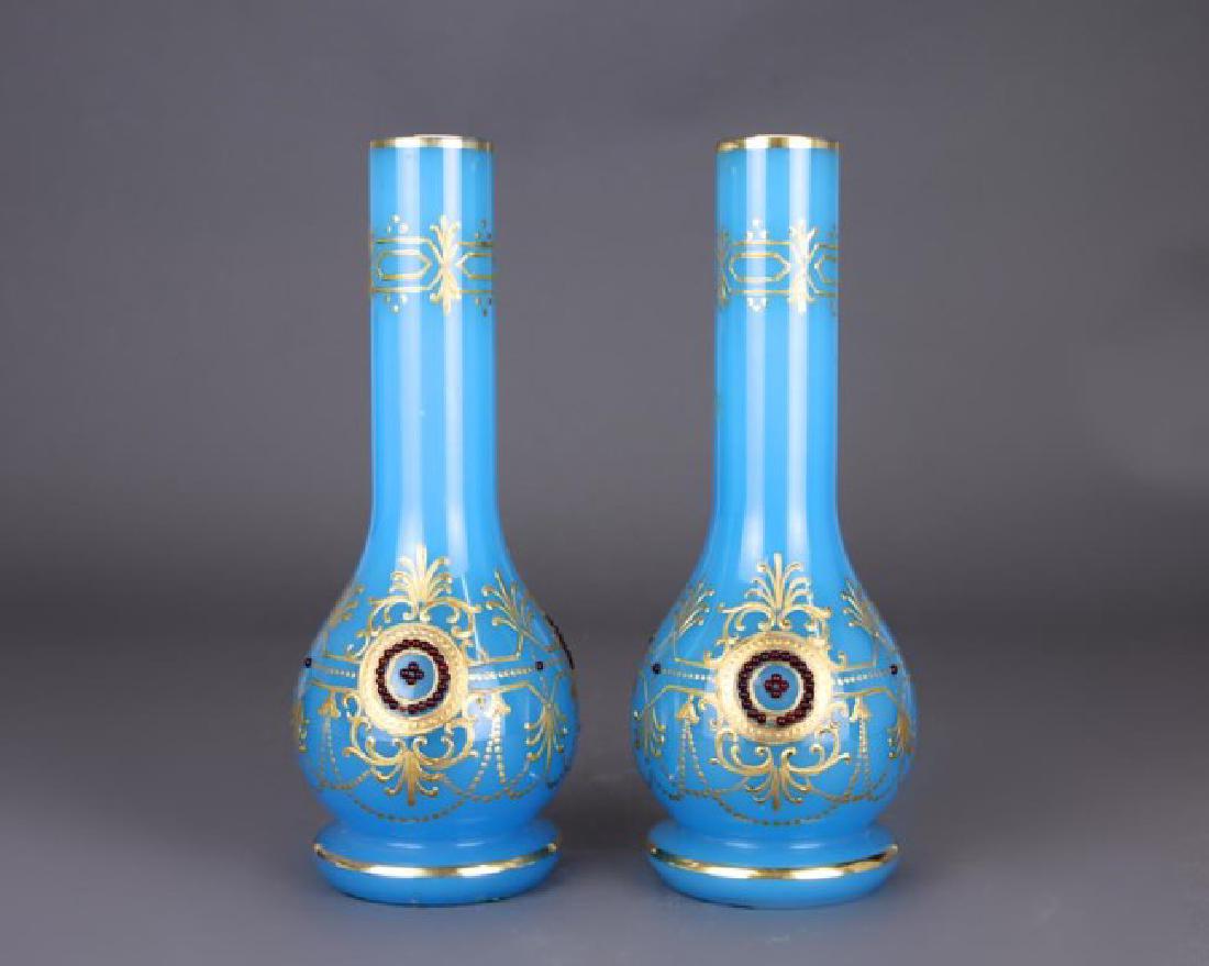 A PAIR OF BLUE GLASS VASES (1 of 1)
